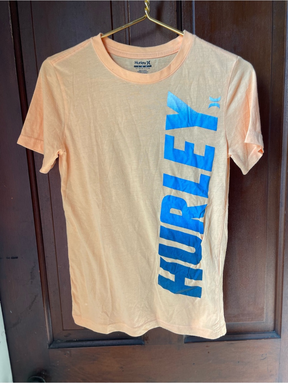 Hurley boys size large short sleeve orange shirt